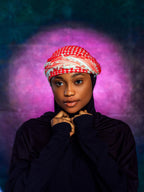 Woman wearing traditional keffiyeh pattern hijab, editorial portrait